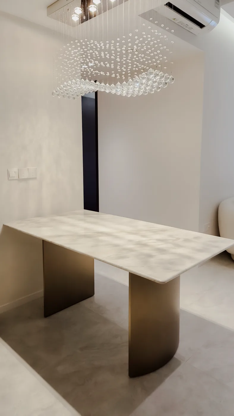 The corner and edge profile of a Calacatta Beige table